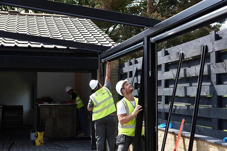 constructing a retractable roof pergola