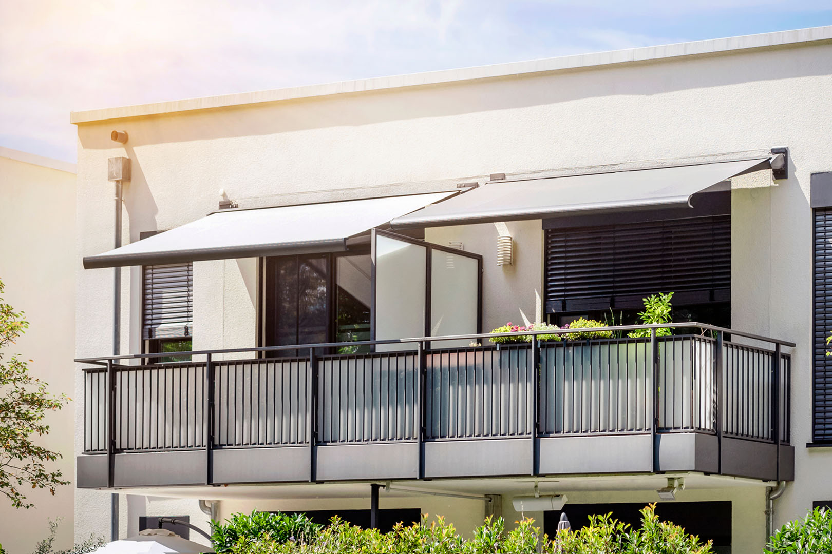 Balcony retractable fabric awnings